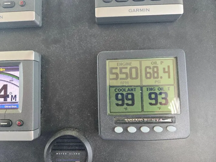 Chinook Yacht Photos Pics Engine control panel displaying RPM, oil pressure, coolant, and oil temperature on a 2010 American Tug 49 Limited.
