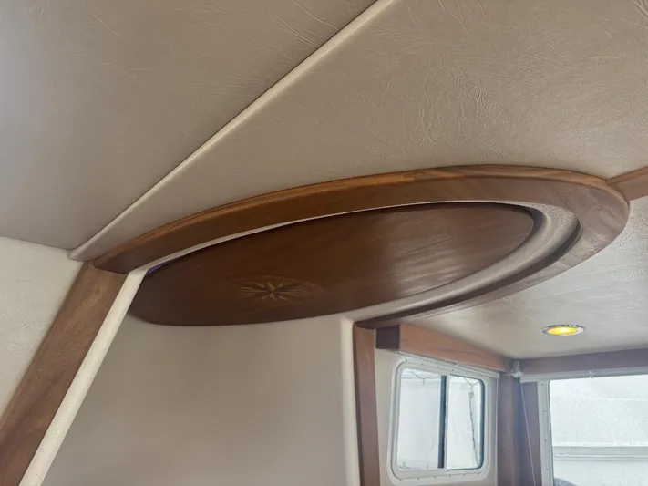 Chinook Yacht Photos Pics Interior ceiling detail of 2010 American Tug 49 Limited with wooden circular design.
