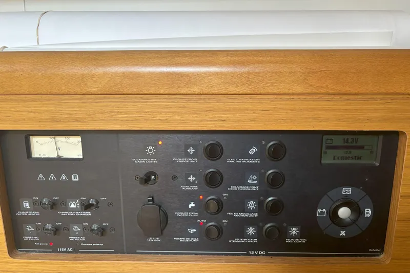  Yacht Photos Pics Control panel of 2009 Jeanneau Sun Odyssey 44i sailboat, featuring various switches and gauges.