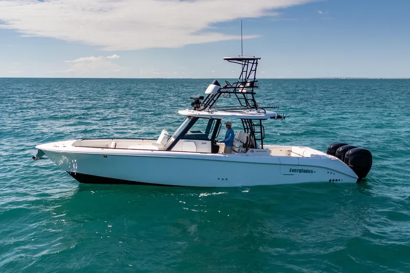 Papa Roach III Yacht Photos Pics 2025 Everglades 375 Center Console boat on open sea, clear sky background.