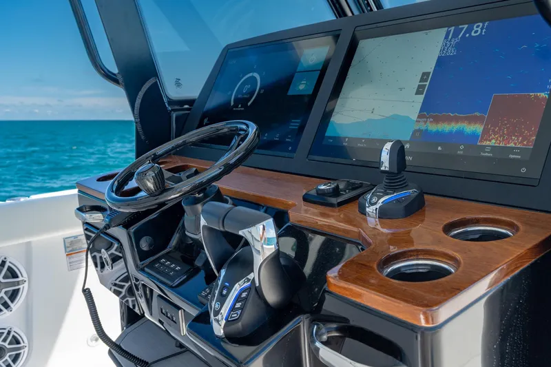 Papa Roach III Yacht Photos Pics 2025 Everglades 375 Center Console dashboard with advanced navigation screens and controls.
