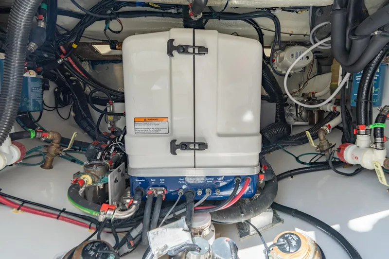 Papa Roach III Yacht Photos Pics Engine compartment of 2025 Everglades 375 Center Console, showcasing wiring and components.