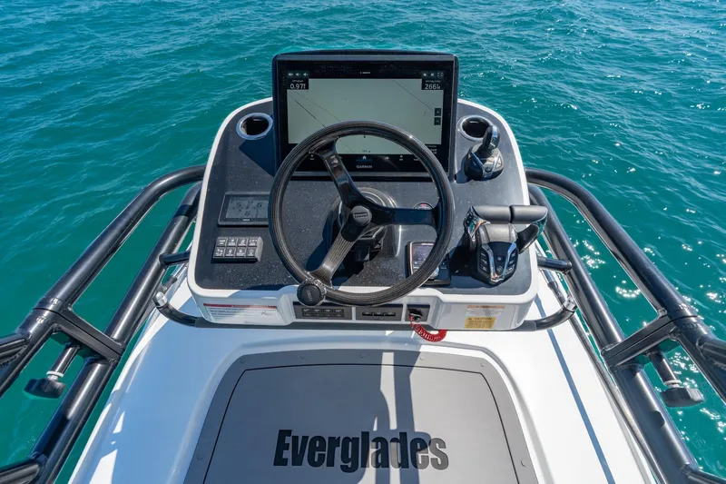 Papa Roach III Yacht Photos Pics 2025 Everglades 375 Center Console helm with advanced navigation system on open water.