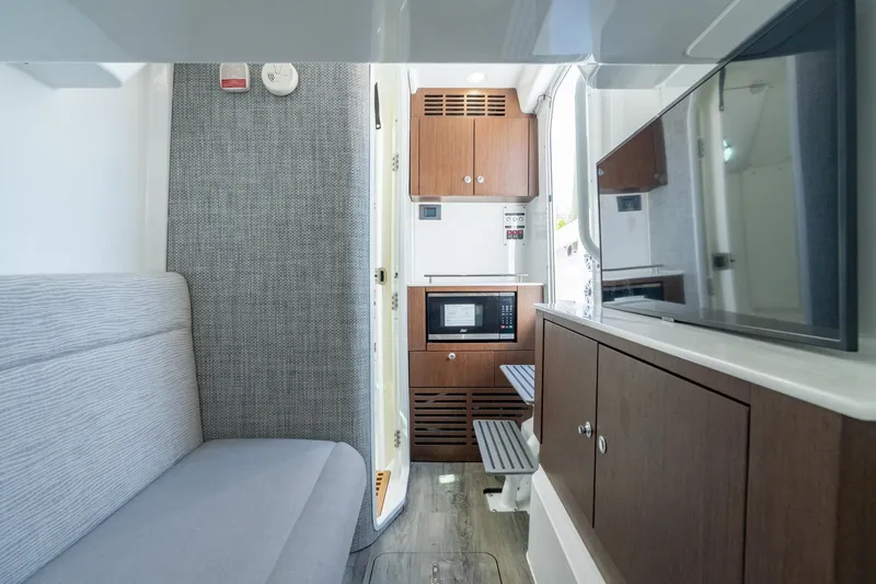 Papa Roach III Yacht Photos Pics Interior of 2025 Everglades 375 Center Console boat with modern amenities and sleek design.