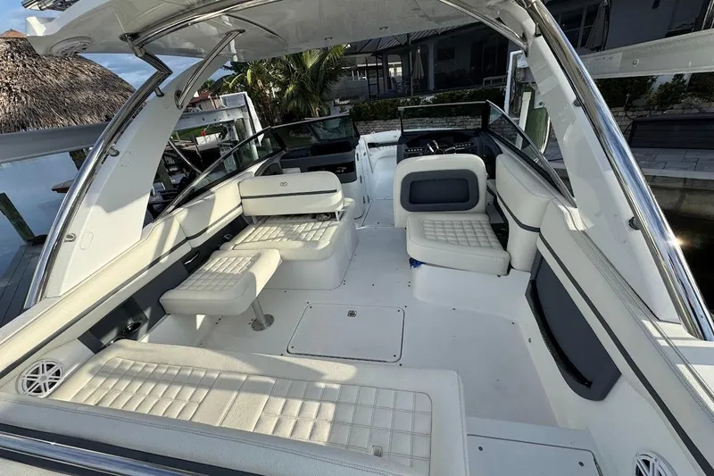  Yacht Photos Pics 2018 Cobalt 30SC boat interior with white seating and modern design.