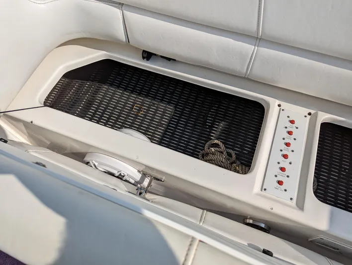  Yacht Photos Pics Interior view of a 2006 Fountain 42 boat showing seating and control panel.