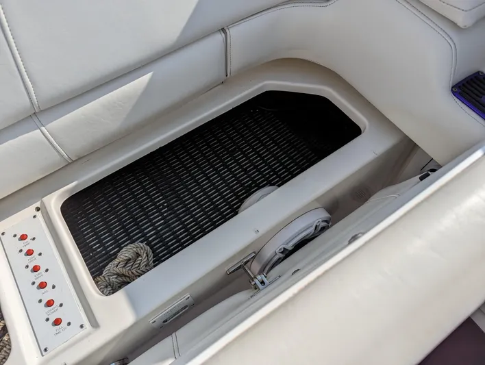  Yacht Photos Pics Interior view of a 2006 Fountain 42 boat, featuring seating and control panel.