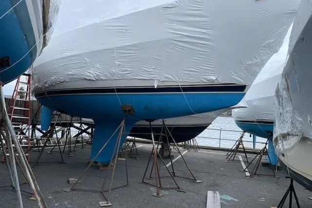 Souwester Yacht Photos Pics 2003 Sabre 362 sailboat in dry dock, covered and supported by stands.