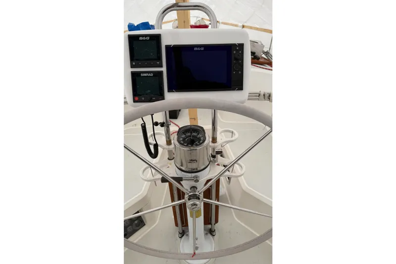 Souwester Yacht Photos Pics Steering wheel and navigation equipment on a 2003 Sabre 362 sailboat.