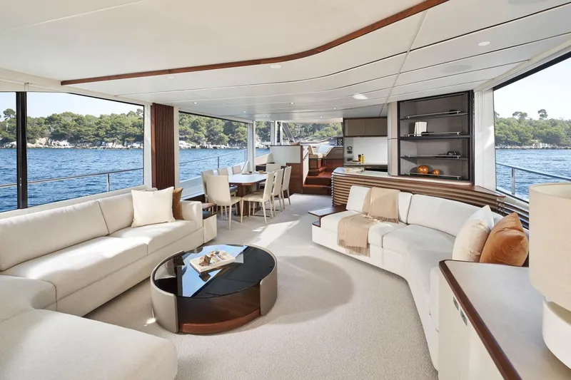  Yacht Photos Pics Luxurious interior of 2024 Princess Y80 yacht with elegant seating and ocean view.