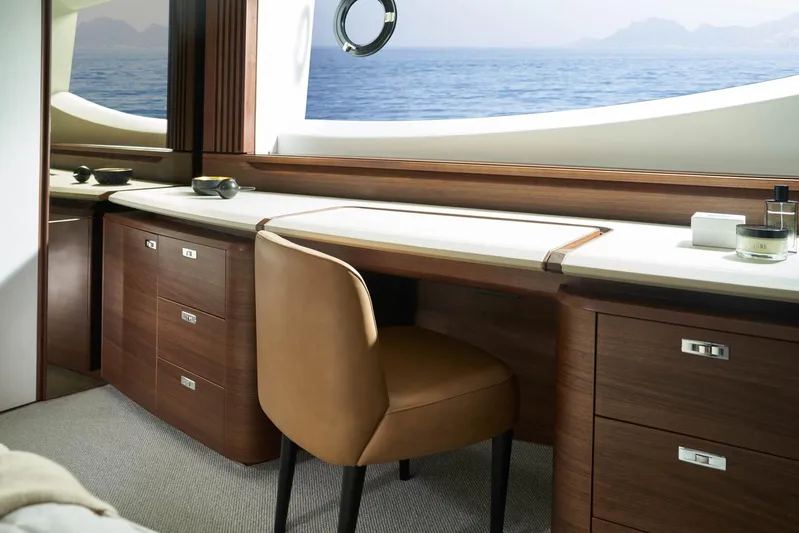  Yacht Photos Pics Luxurious interior of 2024 Princess Y80 yacht with elegant wood finish and ocean view.