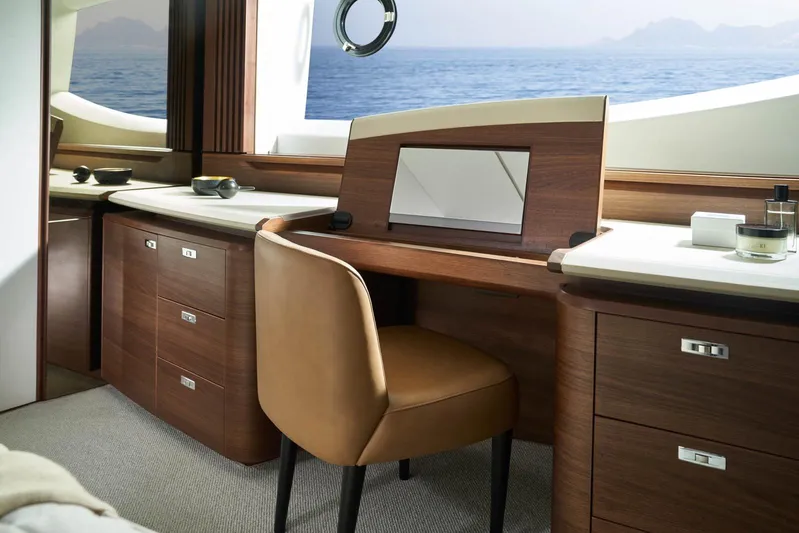  Yacht Photos Pics Luxurious interior of 2024 Princess Y80 yacht with elegant wood finish and ocean view.