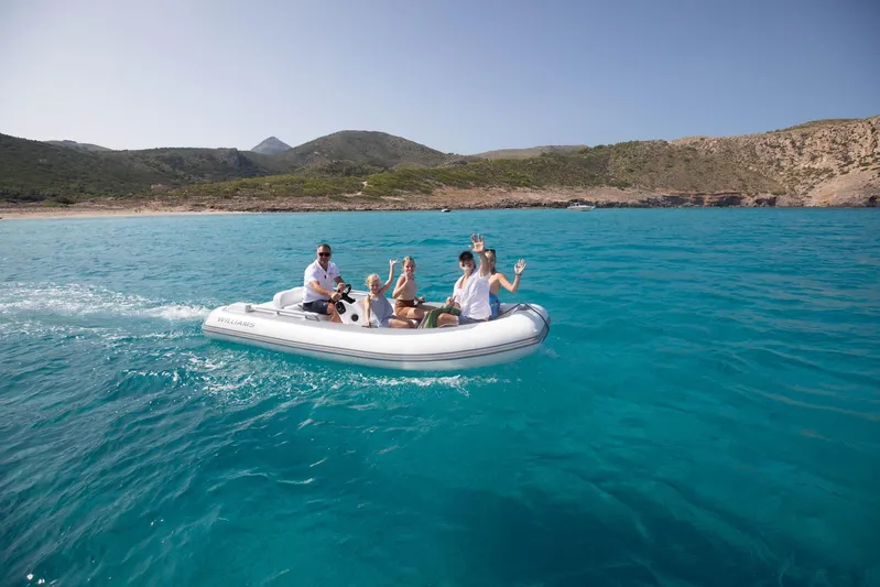  Yacht Photos Pics Family enjoying a boat ride on clear blue waters, Princess Y80, 2024 model.