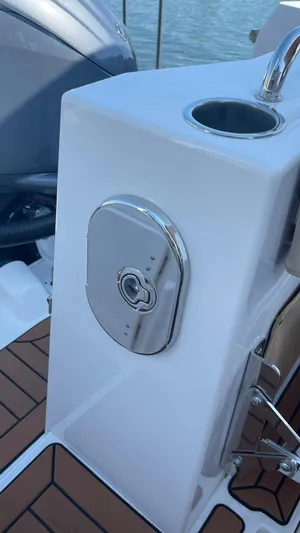  Yacht Photos Pics 2022 Ranger Tugs R-25 boat detail with stainless steel fixtures and teak flooring.