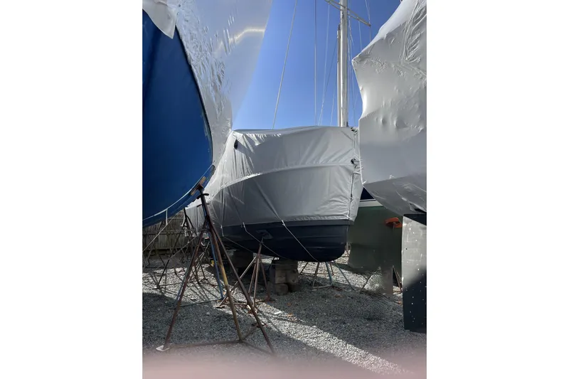 Tusen Takk Yacht Photos Pics 2024 Ranger Tugs R-27 boat covered and stored on land.