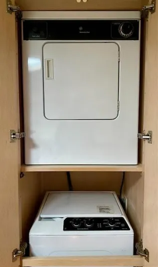  Yacht Photos Pics Laundry appliances in a 1999 Carver 456 Aft Cabin Motor Yacht cabinet.