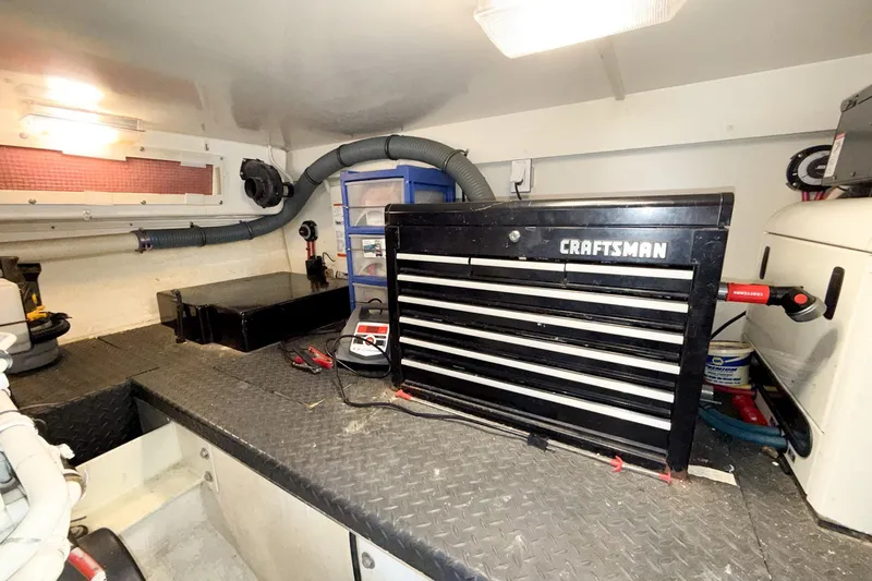 Steel Dreamin Yacht Photos Pics Engine room of 2004 Silverton 48 Convertible with Craftsman tool chest and equipment.