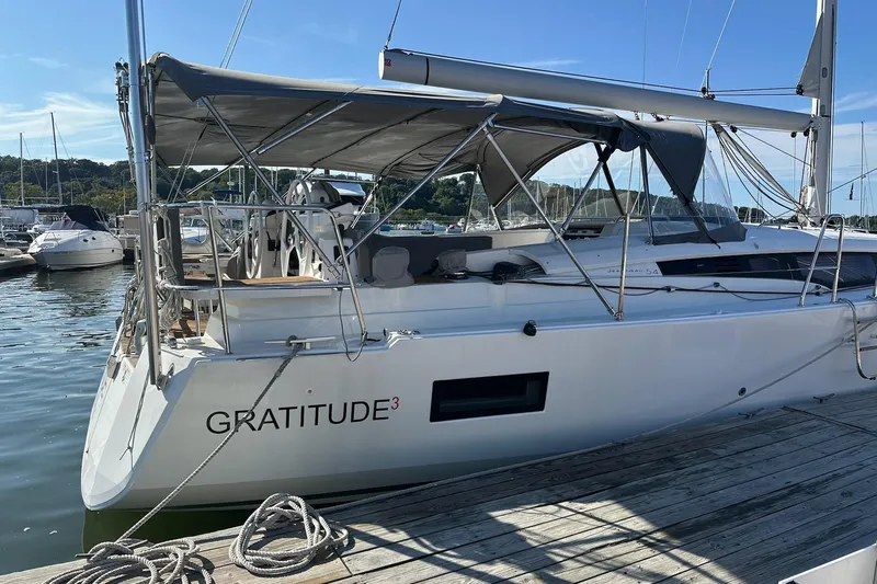  Yacht Photos Pics 2020 Jeanneau 54 sailboat docked at marina, featuring sleek design and spacious deck.