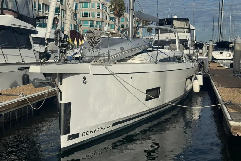  Yacht Photos Pics 2023 Beneteau Oceanis 46.1 yacht docked at marina, showcasing sleek design.