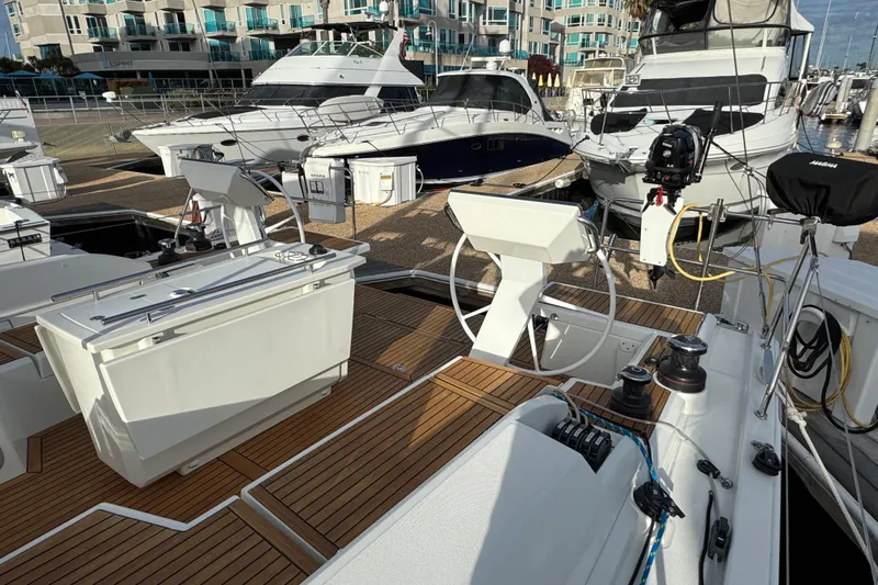  Yacht Photos Pics 2023 Beneteau Oceanis 46.1 sailboat docked at marina with modern design.