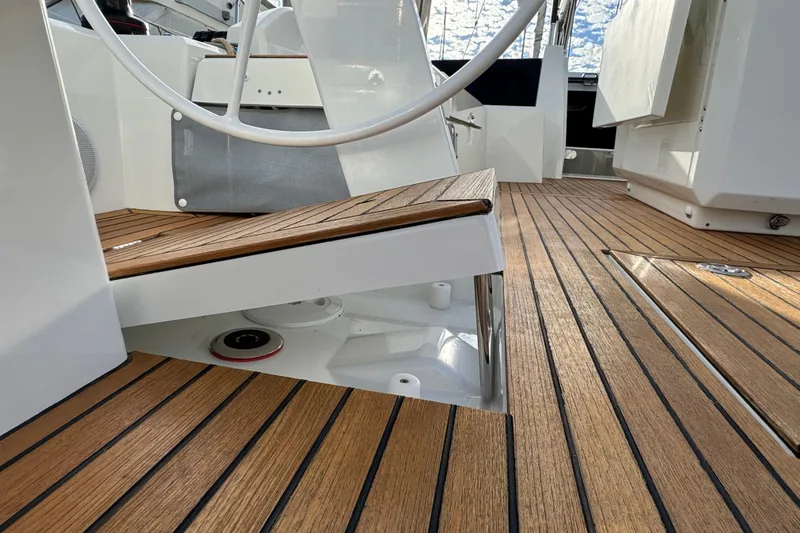  Yacht Photos Pics 2023 Beneteau Oceanis 46.1 yacht deck with elegant wood finish and modern design.