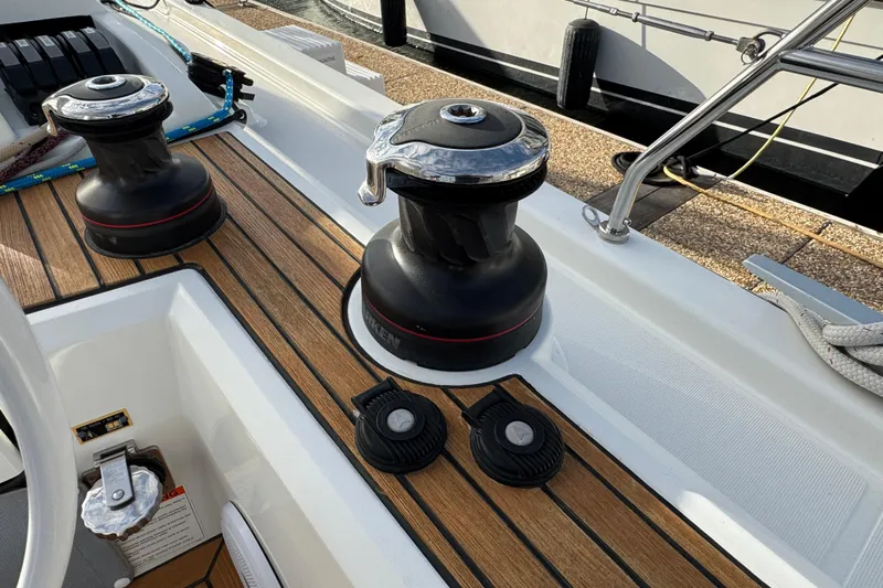  Yacht Photos Pics Deck of 2023 Beneteau Oceanis 46.1 yacht with winches and teak flooring.