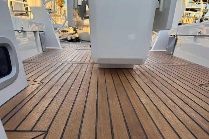 Yacht Photos Pics Teak deck of 2023 Beneteau Oceanis 46.1 yacht, showcasing elegant wood finish.