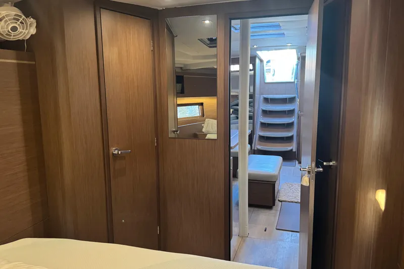  Yacht Photos Pics Interior of 2023 Beneteau Oceanis 46.1 yacht, featuring elegant wood finishes and modern design.