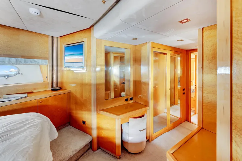  Yacht Photos Pics Luxurious interior of 2007 Sunseeker Predator 108 yacht with elegant wood finishes and modern amenities.