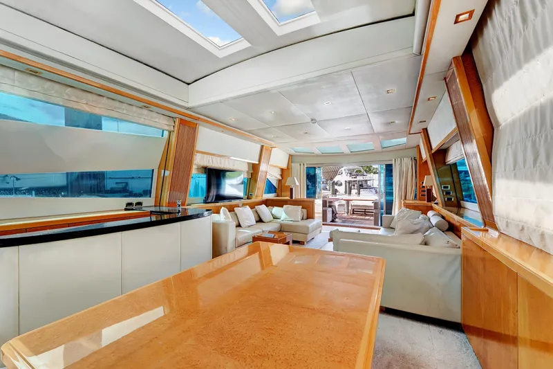  Yacht Photos Pics Luxurious interior of 2007 Sunseeker Predator 108 yacht with modern furnishings and panoramic windows.