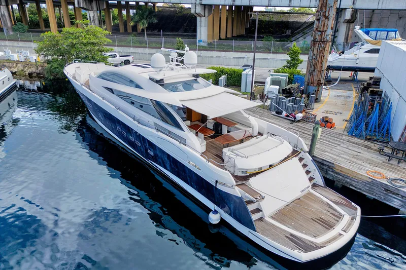  Yacht Photos Pics Luxurious 2007 Sunseeker Predator 108 yacht docked at marina, showcasing sleek design.