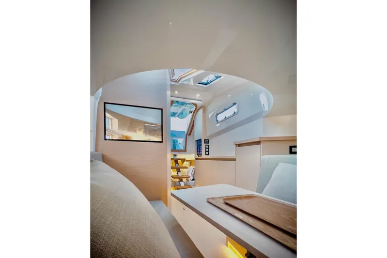Oasis Yacht Photos Pics 2022 Tesoro T40 Inboard yacht interior with modern design and skylights.