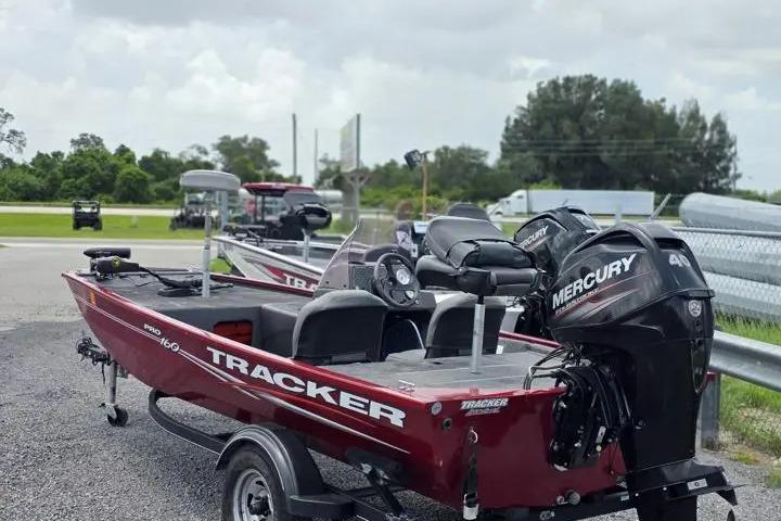 2020 Tracker Pro 160 boat with Mercury engine, parked outdoors on a trailer.