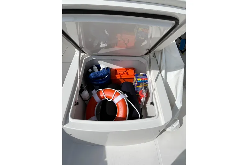  Yacht Photos Pics Storage compartment on 2020 Jupiter 34 Center Console with safety gear and supplies.