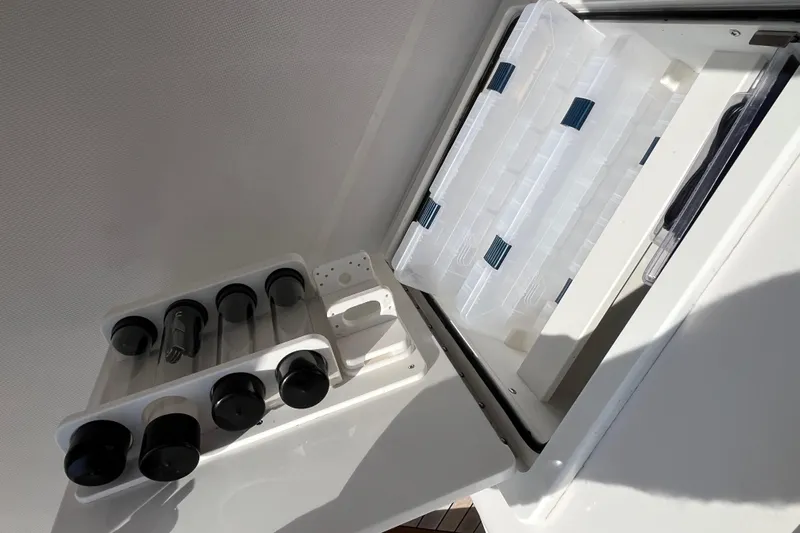  Yacht Photos Pics Storage compartment on 2020 Jupiter 34 Center Console boat with organized containers.