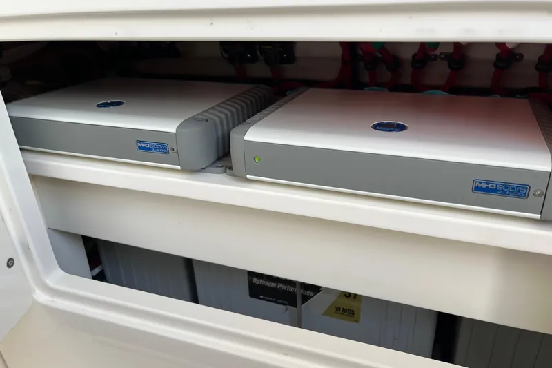  Yacht Photos Pics Audio amplifiers in a 2020 Jupiter 34 Center Console boat compartment.