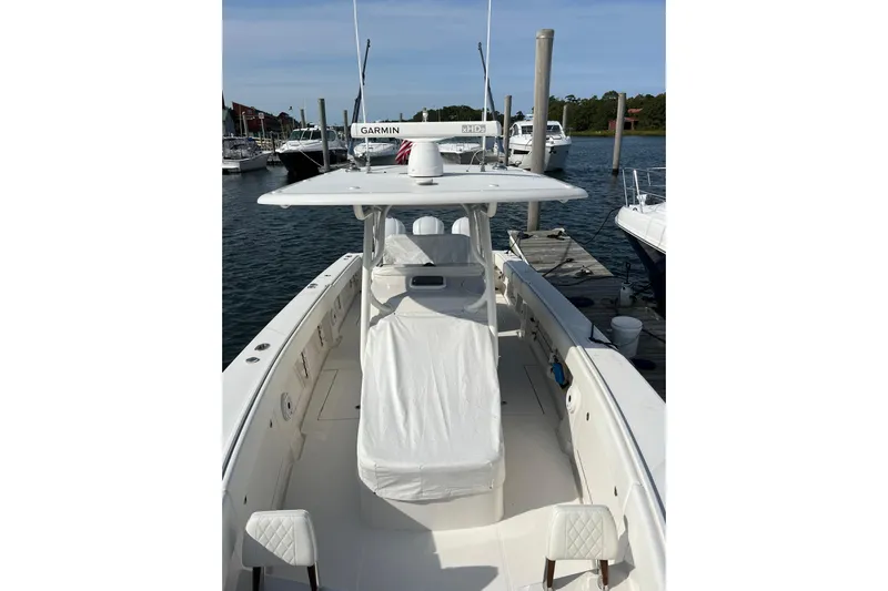  Yacht Photos Pics 2020 Jupiter 34 Center Console boat docked, featuring a sleek design and spacious deck.