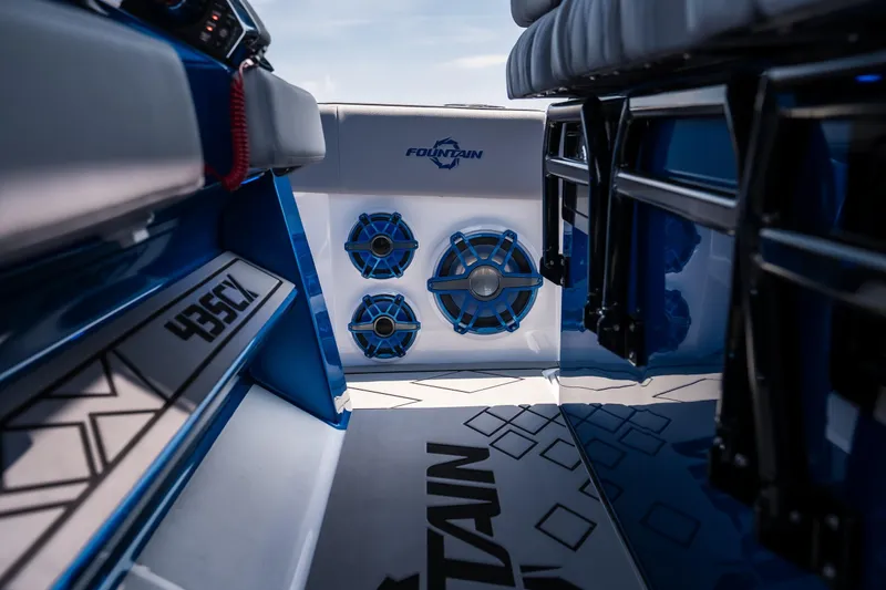  Yacht Photos Pics 2026 Fountain 43 SCX boat interior with blue speakers and sleek design elements.