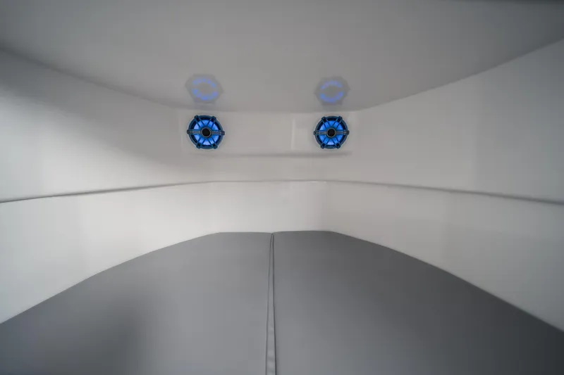  Yacht Photos Pics Interior cabin of 2026 Fountain 43 SCX boat with modern design and blue accents.