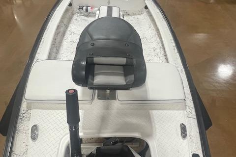 2020 Santee 160TS kayak with padded seat and paddle, displayed indoors.