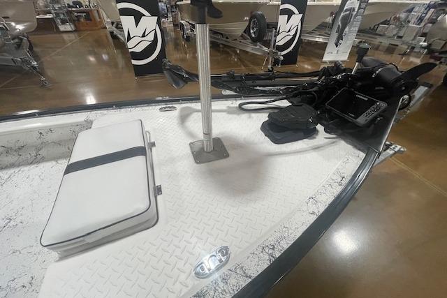 2020 Santee 160TS boat interior with trolling motor and white seat cushion.