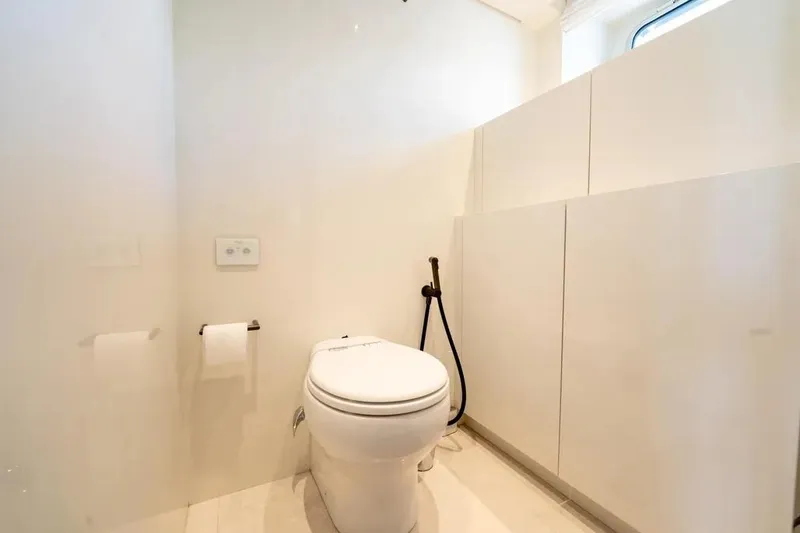  Yacht Photos Pics Modern bathroom on 2021 Sanlorenzo SX76 yacht with sleek white design.