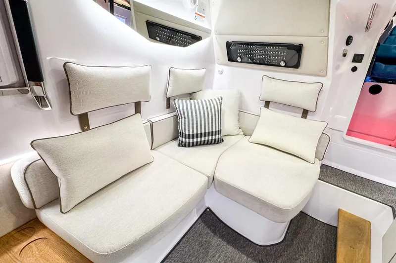  Yacht Photos Pics Luxurious seating area in 2025 Axopar 37 Sun Top BRABUS Trim boat interior.