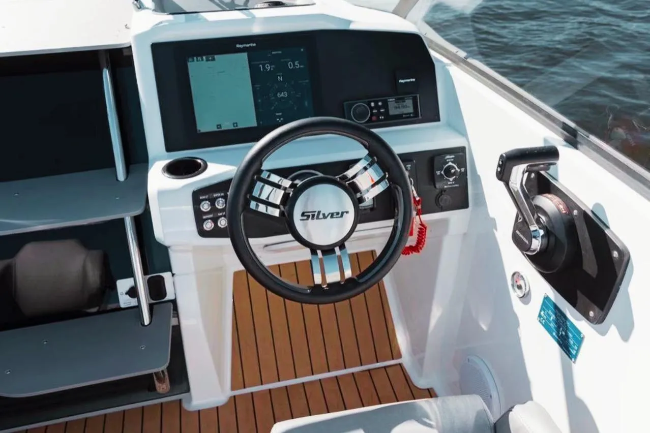 2025 Silver VPR DCZ boat cockpit with modern steering and control panel.