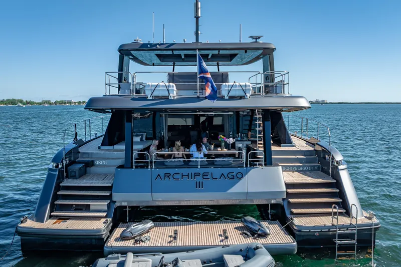 Skip The Wait Yacht Photos Pics 2026 Sunreef 60 Power yacht on water, featuring spacious deck and modern design.