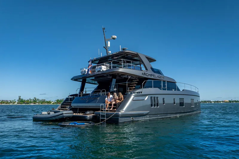 Skip The Wait Yacht Photos Pics 2026 Sunreef 60 Power yacht on water, featuring sleek design and luxury amenities.