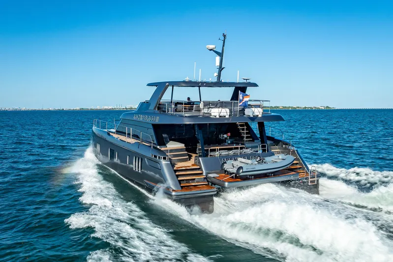 Skip The Wait Yacht Photos Pics Luxurious 2026 Sunreef 60 Power yacht cruising on open sea.