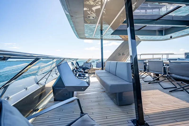 Skip The Wait Yacht Photos Pics Luxurious Sunreef 60 Power yacht deck, 2026 model, featuring modern seating and ocean views.