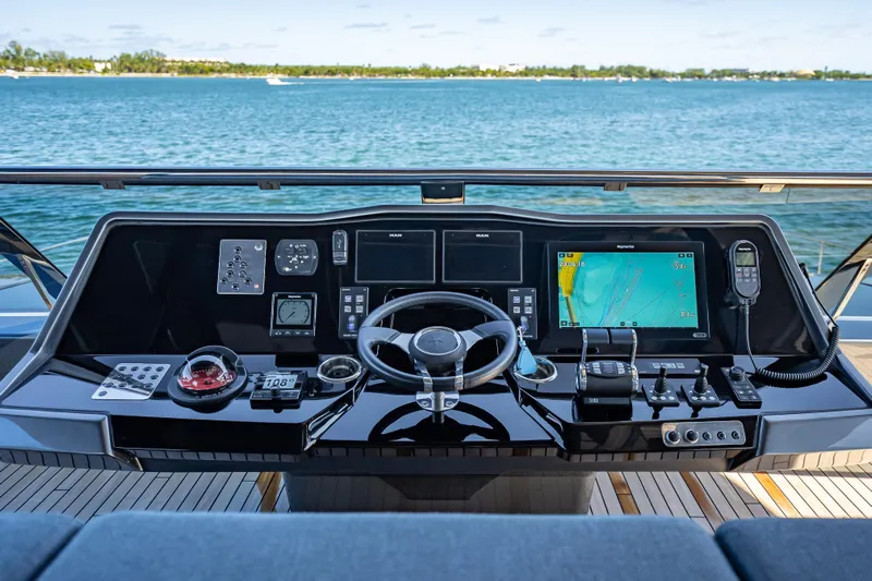 Skip The Wait Yacht Photos Pics 2026 Sunreef 60 Power yacht helm with advanced navigation systems and ocean view.