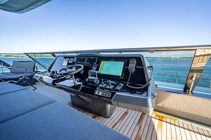 Skip The Wait Yacht Photos Pics Helm of 2026 Sunreef 60 Power yacht with navigation controls and ocean view.